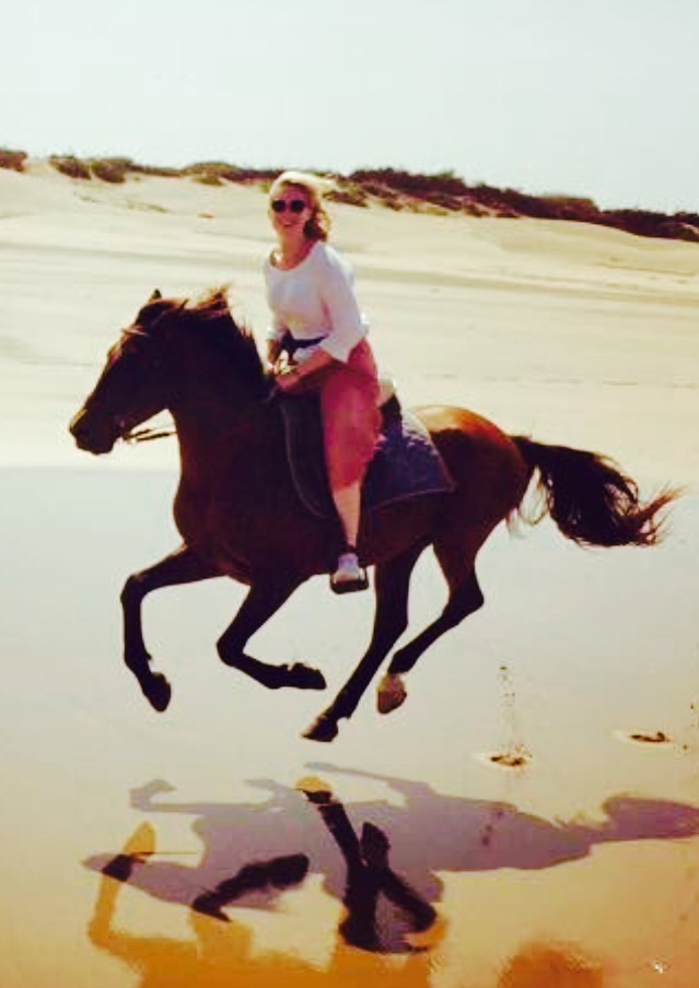 Galloping along a deserted beach in Essaouira